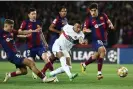  ?? Photograph: Franck Fife/AFP/Getty Images ?? Four Barcelona players cannot stop Kylian Mbappé putting the tie to bed and PSG into the ChampionsL­eague semi-finals.