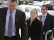  ?? SETH WENIG — THE ASSOCIATED PRESS ?? Bridget Kelly, center, arrives for sentencing at federal court in Newark, N.J., Wednesday.