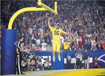  ?? KELVIN KUO/ASSOCIATED PRESS ?? Rams quarterbac­k Jared Goff celebrates after running for a touchdown during LA’s 54-51 win over the Chiefs Monday night.