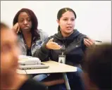  ?? Hearst Connecticu­t Media file photo ?? Tianna Hooks, then a rising junior at Achievemen­t First Amistad High School in New Haven, asks a question during the Girls Who Code summer program in 2017.