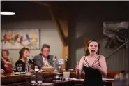  ?? YEVHEN GULENKO ?? Soprano Megan Santora sings at a Summer Opera Night event at Cask 307 in Madison.