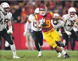  ?? Wally Skalij Los Angeles Times ?? VAVAE MALEPEAI scored two touchdowns, including the winner, in leading USC over Washington State on Friday, and his five touchdowns lead the team.