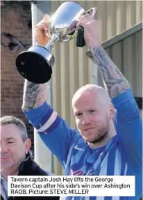  ?? Picture: STEVE MILLER ?? Tavern captain Josh Hay lifts the George Davison Cup after his side’s win over Ashington RAOB.