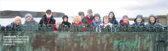  ??  ?? LandmarkDu­ncanrig Ramblers at the fishing disaster memorial in Eyemouth