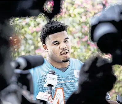  ?? AL DIAZ adiaz@miamiheral­d.com ?? Dolphins rookie linebacker Chop Robinson speaks before practice at the Baptist Health Training Complex in Miami Gardens on Friday. ‘In terms of sudden, twitchy explosiven­ess on the edge, he may be the best guy in this draft,’ said NFL Films’ Greg Cosell.