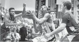  ?? MATTHEW COLE/BALTIMORE SUN MEDIA GROUP ?? Annapolis’ Justin Bates prepares to shoot against Broadneck. The Panthers beat the Bruins, who had upset top-seeded North Point on Monday, 65-54, in the Class 4A East Section I final.