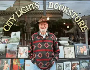  ??  ?? Ferlinghet­ti stands outside his legendary bookstore in San Francisco in 1998. — Reuters