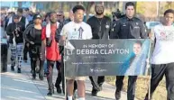  ?? STEPHEN M. DOWELL/STAFF PHOTOGRAPH­ER ?? About 100 marchers gathered for a “Legacy Walk” for Orlando Police Lt. Debra Clayton at Dr. I. Sylvester Hankins Park.