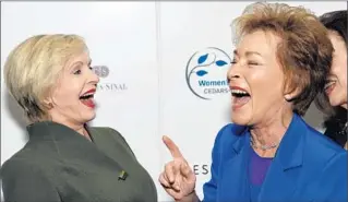  ?? Amanda Edwards
WireImage ?? FLORENCE HENDERSON, left, and Judy Sheindlin, a.k.a. Judge Judy, at the Women’s Guild Cedars-Sinai luncheon and Escada fashion show at the Beverly Wilshire Hotel on Monday.