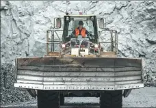  ?? XINHUA ?? An employee drives a vehicle at leading Chinese steel manufactur­er Shougang Group’s mine in Peru.