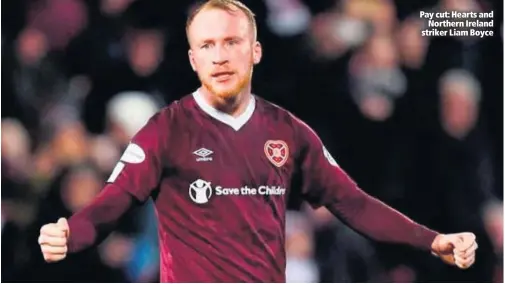  ??  ?? Pay cut: Hearts and
Northern Ireland striker Liam Boyce