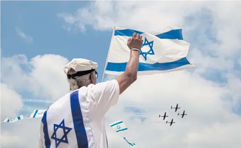  ??  ?? STATE OF AFFAIRS: An Israeli air force flyover during Israel’s 64th Independen­ce Day anniversar­y celebratio­ns in Tel Aviv. Israel marked the 70th anniversar­y of statehood on Wednesday.