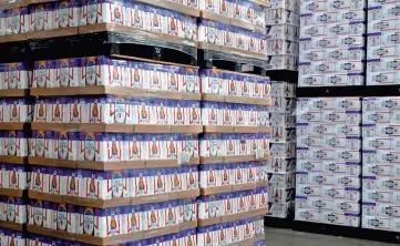  ?? DOUG HOKE/THE OKLAHOMAN ?? The Anheuser-Busch Sales of Oklahoma warehouse contains about 400,000 cans of beer and seltzer recently, which is about a 10-day supply.