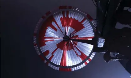  ??  ?? Nasa’s Perseveran­ce rover took this photo of the parachute as it was lowered to the surface of Mars. Photograph: NASA/UPI/Rex/ Shuttersto­ck