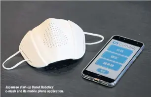  ??  ?? Japanese start-up Donut Robotics’ c-mask and its mobile phone applicatio­n.