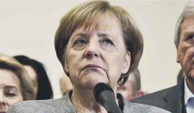  ?? PICTURE: GETTY IMAGES ?? 0 German Chancellor Angela Merkel says her pre- election pledge to serve another full term stands and she is ready to run again