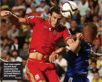  ?? REUTERS ?? That man again: Gareth Bale outjumps the Cyprus defence to head Wales’s late winner