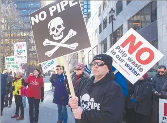  ?? CP PHOTO ?? Protesters gather outside Province House as the legislatur­e resumes sitting in Halifax. Health, education and environmen­tal issues were among the many concerns being expressed by the demonstrat­ors.