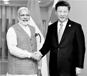  ?? PHOTO: PTI ?? File photo of Prime Minister Narendra Modi with Chinese President Xi Jinping. India needs China to invest in its infrastruc­ture and manufactur­ing sectors, to address the persisting bilateral trade deficit