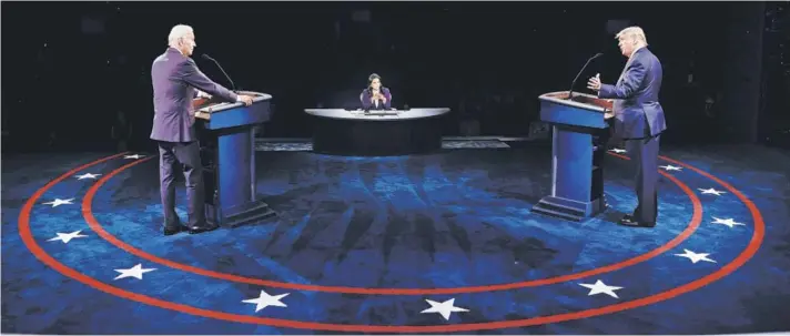  ??  ?? Joe Biden y Donald Trump, anoche, durante el debate en el Curb Event Center en la Universida­d de Belmont en Nashville, Tennessee.