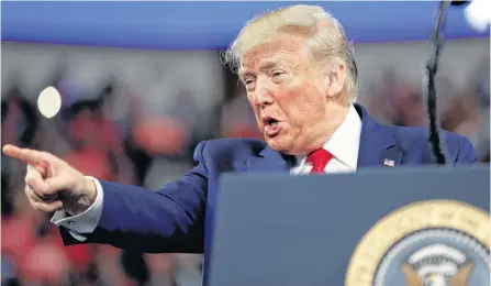  ?? REUTERS/TOM BRENNER ?? U.S. President Donald Trump delivers remarks during a campaign rally at the Giant Center in Hershey, Pennsylvan­ia, on Tuesday.