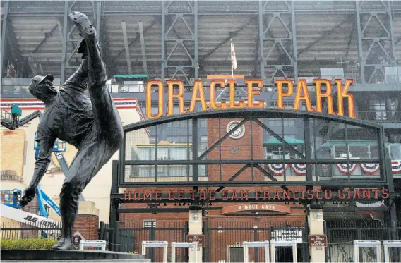  ?? Jeff Chiu / Associated Press ?? The statue of Juan Marichal at Oracle Park remains the same, but there are plenty of changes inside the park, including the debut of Super Duper Burgers.