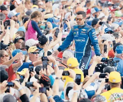  ?? AP FILE ?? After winning 10 races and the NASCAR Cup in his return from a suspension last season, Kyle Larson has emerged as a real fan favorite.