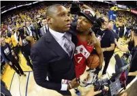  ?? ANDREW D. BERNSTEIN NBAE/GETTY IMAGES FILE PHOTO ?? Raptors president Masai Ujiri celebrates with Kyle Lowry after winning the NBA championsh­ip against Golden State last year.