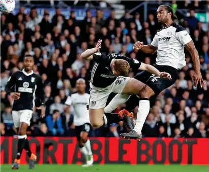  ?? REUTERS ?? High and mighty: Jerome times his leap perfectly to head Derby’s first-leg winner