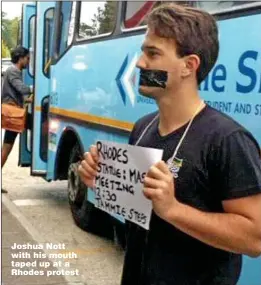  ??  ?? Joshua Nott with his mouth taped up at a Rhodes protest