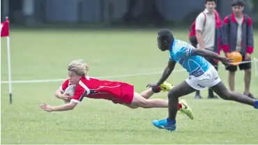  ??  ?? Rotorua Boys’ High School’s Will Florence, 14, scores a try against the under-14 rugby team from Suva, Fiji. on November 30, 2017.
Photo: Rotorua Daily Post