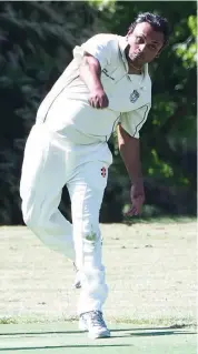  ??  ?? Western Park’s Lassie Amaroosyra bowls during the division two match against Jindivick.