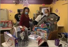  ?? SUBMITTED PHOTO ?? Harrah’s Philadelph­ia Casino and Racetrack donates presents to area children through its Adopt A Kid program.
