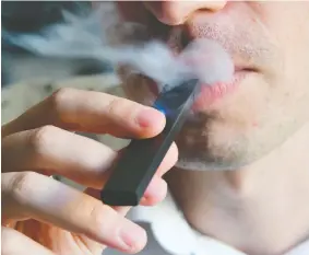  ?? EVA HAMBACH / AFP / GETTY IMAGES ?? Respirator­y illnesses associated with vaping in the U.S. have been mainly found
in teenagers. There have been no reports of the same sickness in Canada.