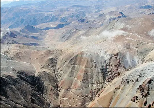  ??  ?? Barrick Gold’s Pascua- Lama project, located in virgin land amid glaciers that feed rivers below, can experience winds of up to 300 kilometres an hour. The Chilean government suspended the pre- stripping of the mine in October over concerns that...