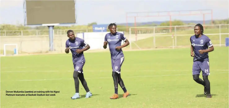  ??  ?? Denver Mukamba (centre) at training with his Ngezi Platinum teamates at Baobab Stadium last week