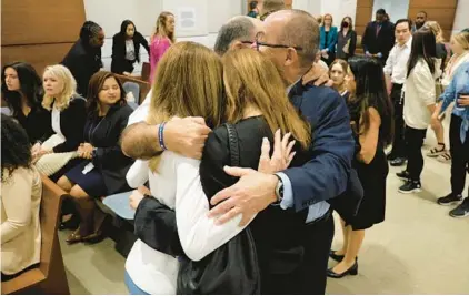  ?? AMY BETH BENNETT/SOUTH FLORIDA SUN SENTINEL ?? Linda Beigel Schulman, Michael Schulman, Patricia Padauy Oliver and Fred Guttenberg were in the courtroom Thursday to hear the verdict in the sentencing trial at the Broward County Courthouse in Fort Lauderdale.