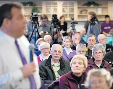  ?? Matthew Cavanaugh Getty I mages ?? CHRIS CHRISTIE speaks at a campaign event in Bow, N. H. The GOP candidates have steered the immigratio­n conversati­on away from what to do with those in the country illegally, making it largely about terrorism.