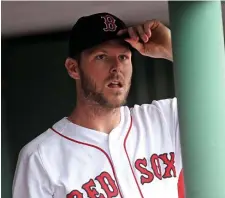  ?? MATT STONE / BOSTON HERALD ?? LOOKING MUCH BETTER: Chris Sale watches from the Red Sox dugout after his six shutout innings in yesterday’s 5-0 victory against the Blue Jays at Fenway.