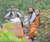  ?? AFP ?? Taliban fighters sit in the greenhouse yard at the home of Afghan warlord Abdul Rashid Dostum in Kabul.