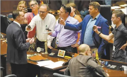  ?? AP photo ?? Arizona state Rep. Matt Gress, R-Phoenix, speaks to reporters on the House floor at the Capitol, Wednesday, in Phoenix. The Arizona Supreme Court ruled Tuesday that the state can enforce its long-dormant law criminaliz­ing all abortions except when a mother’s life is at stake.