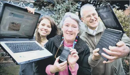  ??  ?? Margaret Rowling is pictured with, left, Youth Worker for Scripture Union Emily Finch and ‘Blog Father’ Brian Williams who have both assisted in putting Filey firmly on the Twitter map 120853