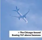  ??  ?? &gt; The Chicago-bound Boeing 767 above Swansea