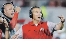  ?? ASSOCIATED PRESS FILE PHOTO ?? Zach Smith, left, was fired by Ohio State after allegation­s of domestic abuse. Head coach Urban Meyer was put on administra­tive leave Wednesday pending an investigat­ion into how much he knew about it.