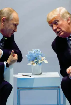  ??  ?? Vladimir Putin, 65 anni, e Donald Trump, 71 anni, al summit del G20 del luglio scorso