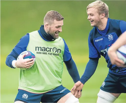  ??  ?? PLAYING IT FOR LAUGHS: John Barclay, left, with Luke Hamilton during Scotland training