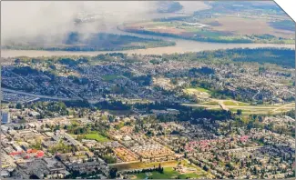  ?? Photo by Alexander Serzhantov/Unsplash. ?? A recent StatsCan report notes that about half of all homeowners in Metro Vancouver (Surrey’s Guildford area is pictured here) are immigrants.