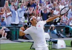  ?? KIRSTY WIGGLESWOR­TH/AP ?? Switzerlan­d’s Roger Federer celebrates after beating Spain’s Rafael Nadal in a Men’s singles semifinal match on day eleven of the Wimbledon Tennis Championsh­ips in London, Friday, July 12, 2019.