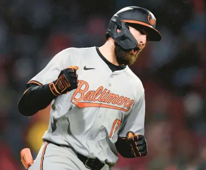  ?? ORIOLES
RESET
CHARLES KRUPA/AP ?? Orioles rookie outfielder Colton Cowser pumps his fist while rounding the bases after hitting a solo home run in the fifth inning Thursday against the Red Sox in Boston. It was his first career homer, and he’s hit three more since.