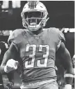  ?? DUANE BURLESON/AP ?? Detroit Lions’ Kerryon Johnson left Sunday’s game against the Carolina Panthers with a left knee injury after rushing for 87 yards and a touchdown.